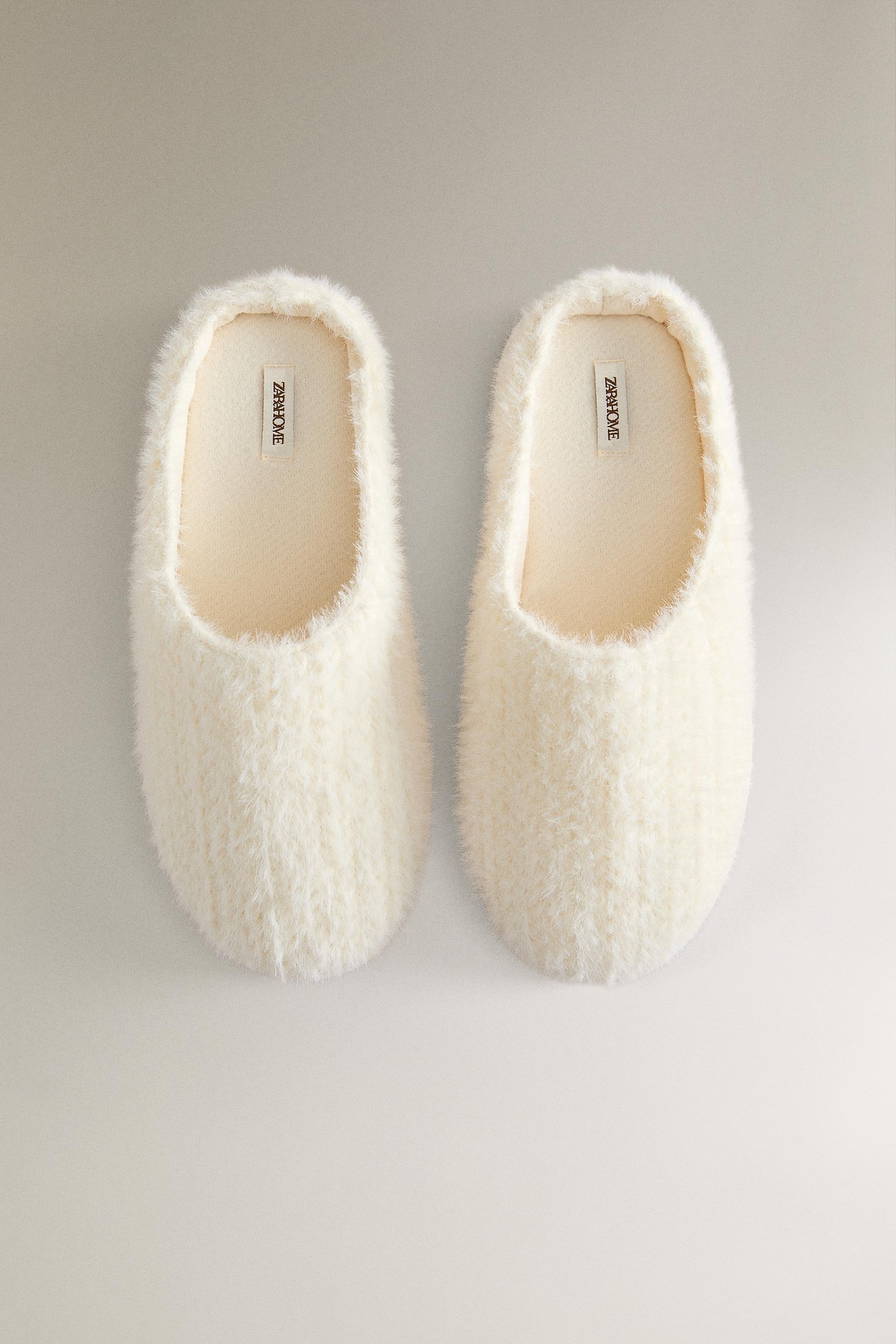 SLIPPERS WITH BRAIDED FAUX FUR DETAIL